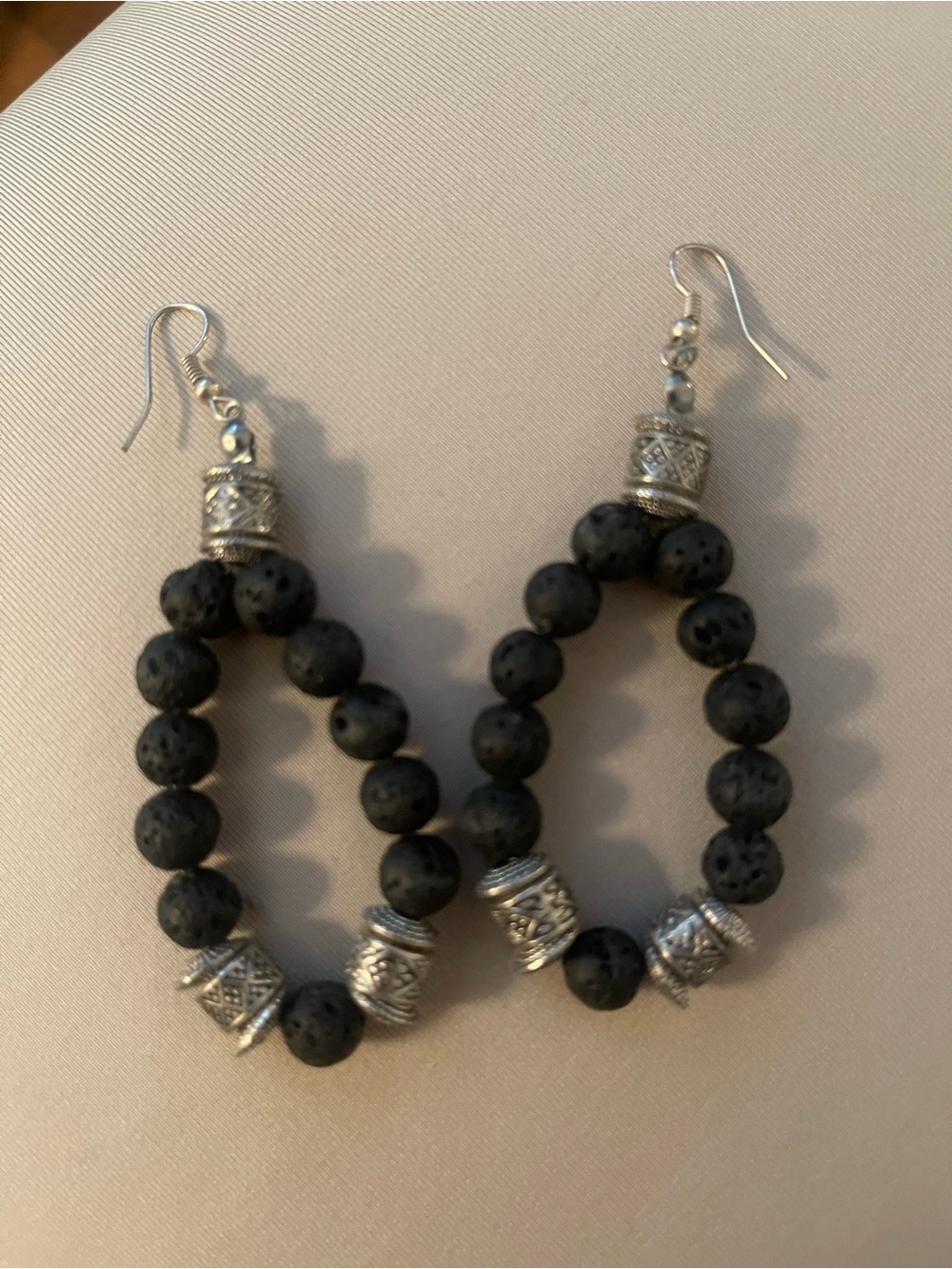 Handcrafted lava rock earrings With Silver Accents